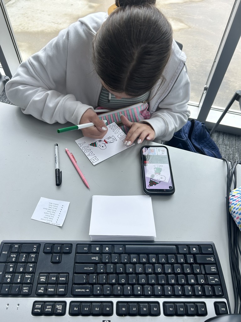 Yearbook staff member making a Christmas card