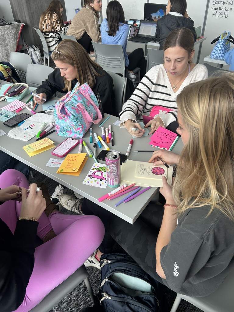 Yearbook staff members making Christmas cards