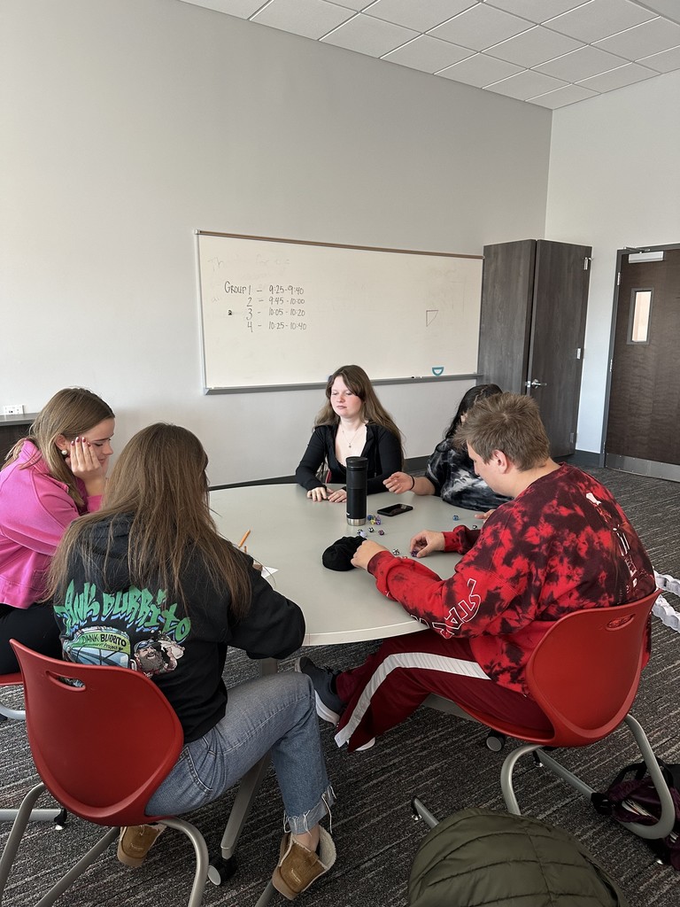 Students working together to gather data for a statistics project