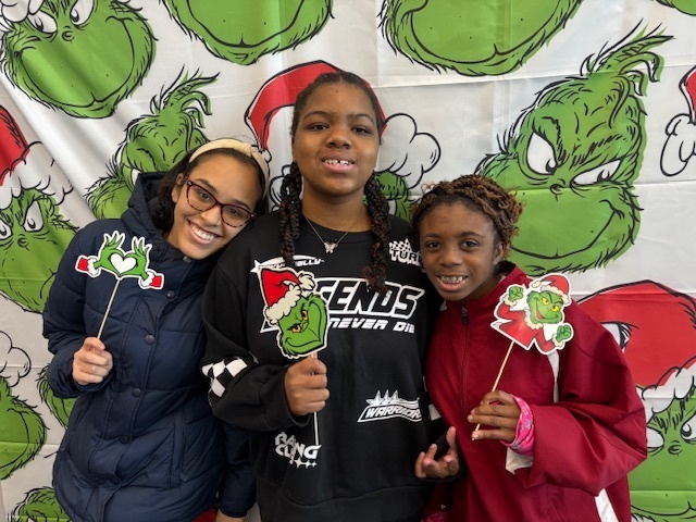 Students in front of Grinch background