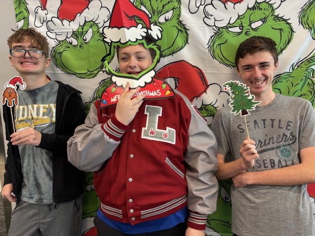 Students in front of Grinch background