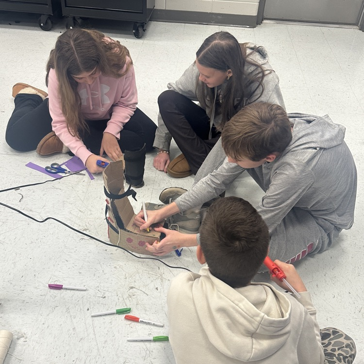 students working on ortho-boot