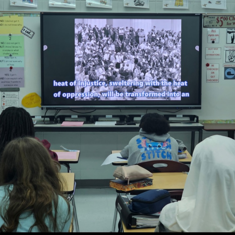 students watching speech