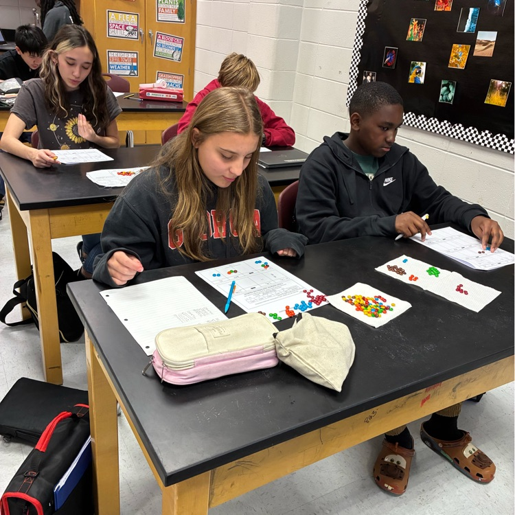 student solving equations with m and ms