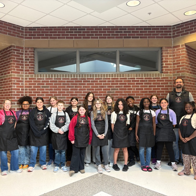 students wearing aprons