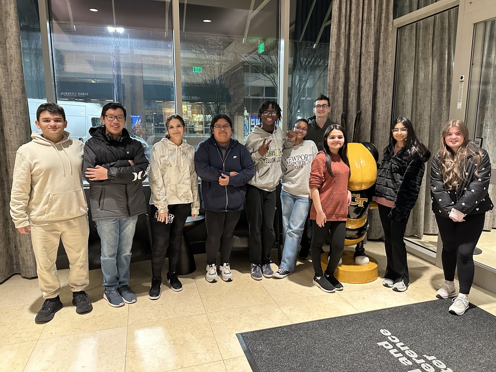 Students with the GA Tech mascot statue