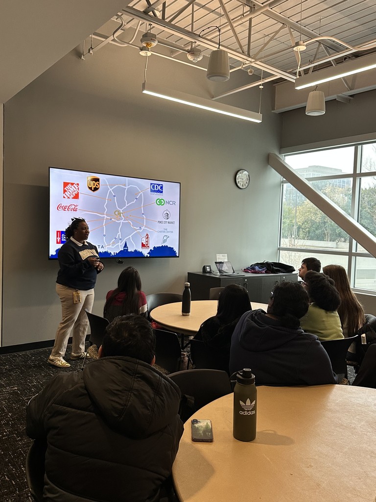Students listening to presenter