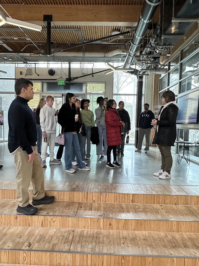 Students listening to presenter