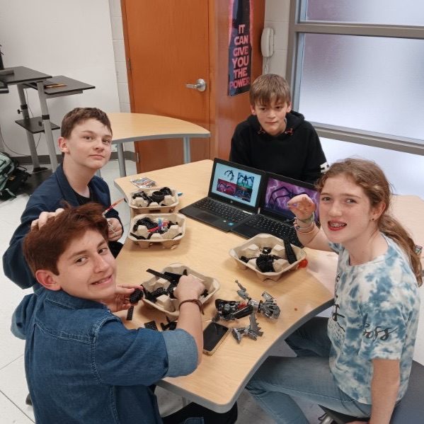 students working with Legos