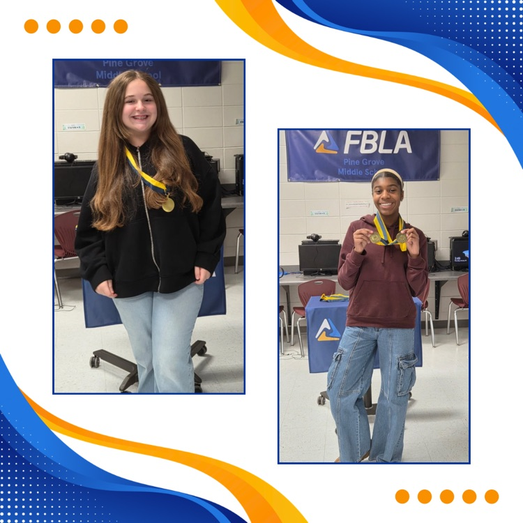FBLA members posing with medals 