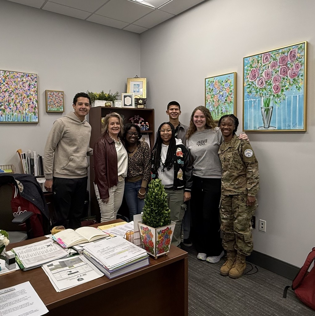 Principal Pearson with the morning announcement crew.