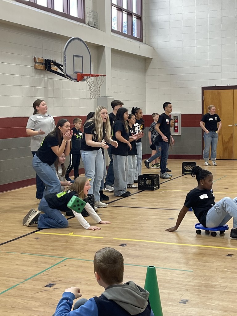Students playing games in the gym