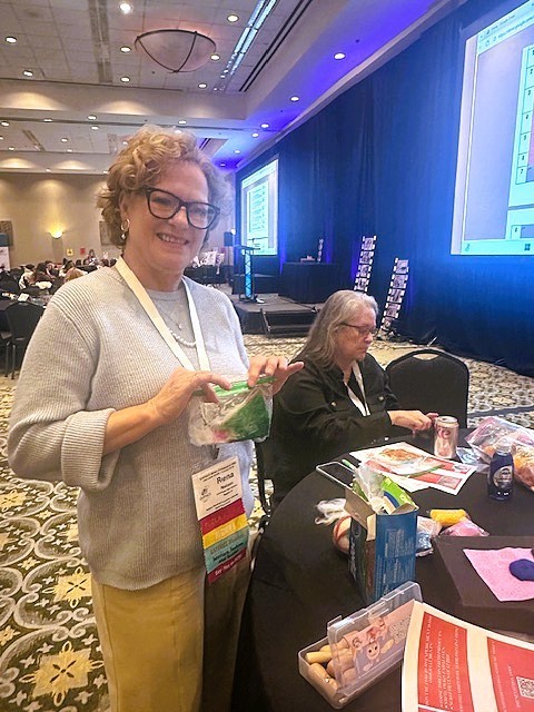 Mrs. Nelson at conference