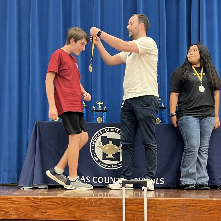 Elijah getting medal