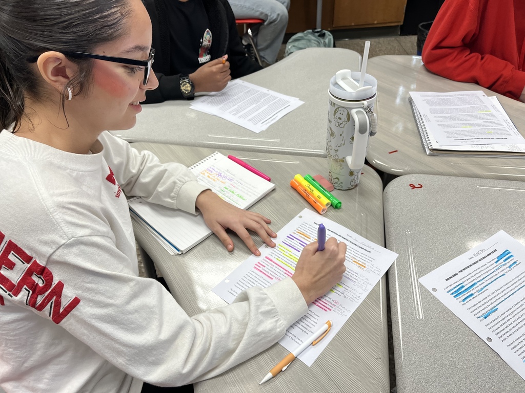 Student reading and annotating