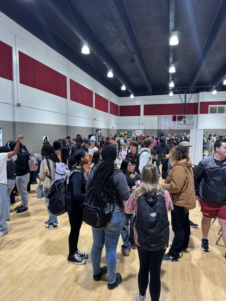 Students visiting business tables at the Career Fair