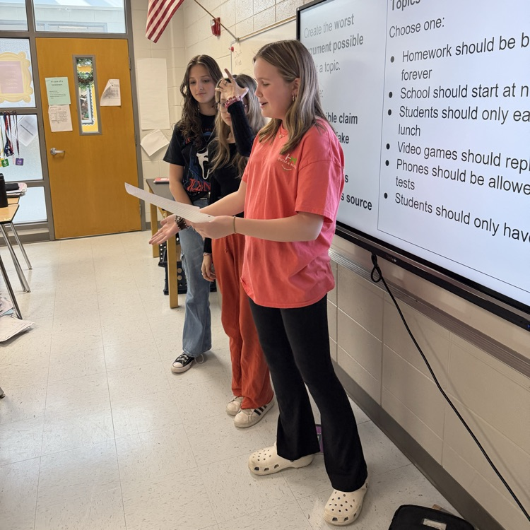 students reading argument 