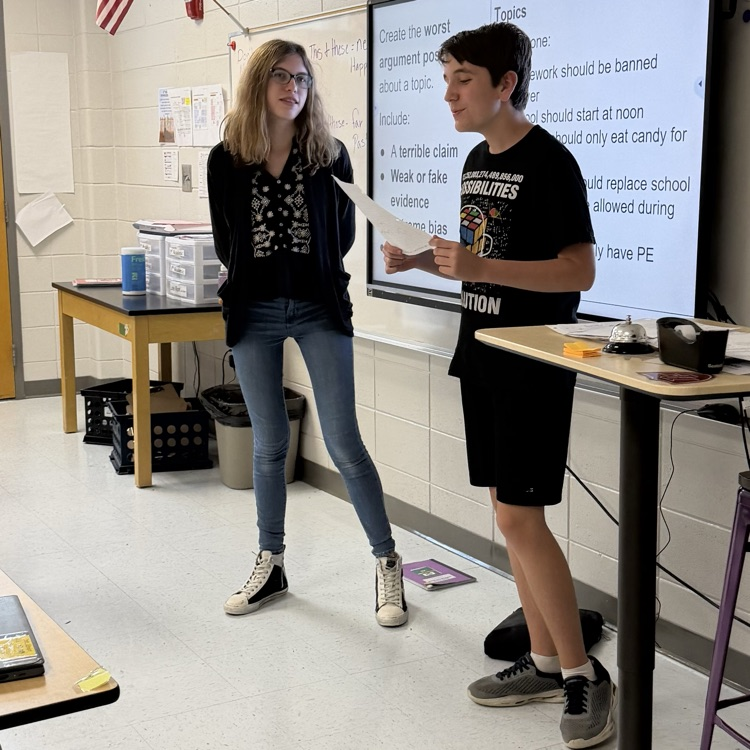 students reading argument 