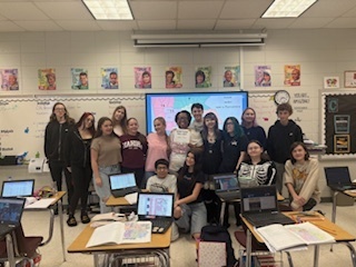 Ms. Gaston Stack with her students after being presented with a certificate of recognition