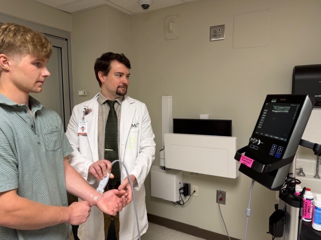 Allied health student participating in a simulation