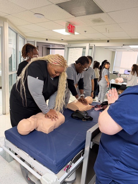 Allied health student participating in a simulation