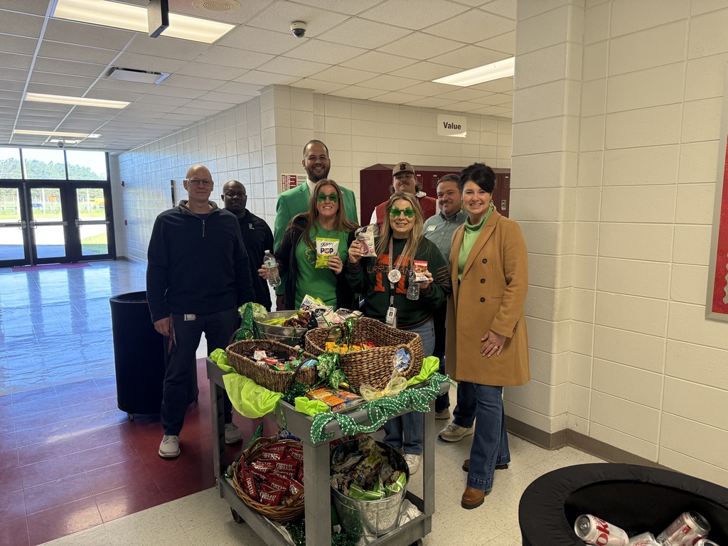 Admin with science teachers and the Whoop Whoop Wagon