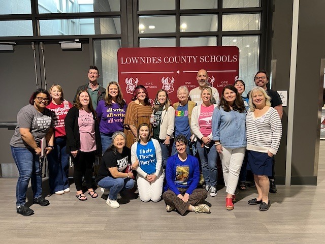 Teachers dressed in subject related shirts