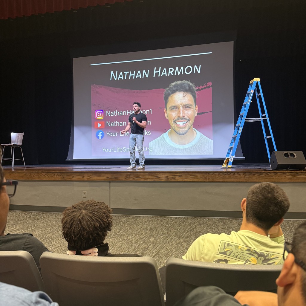 Nathan Harmon speaking to LHS students