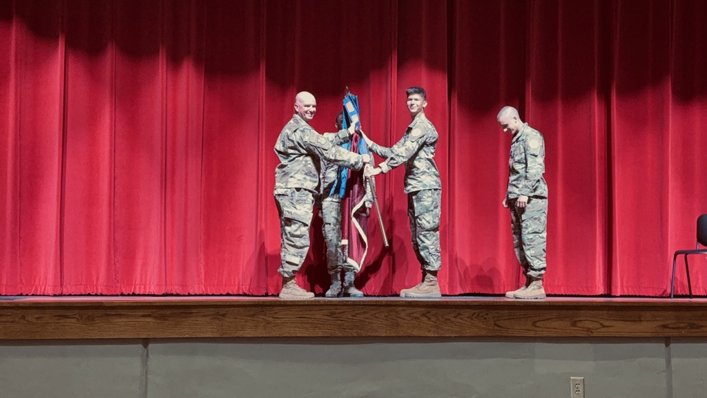 Cadet Colonel Matthew Youmans receiving the guidon