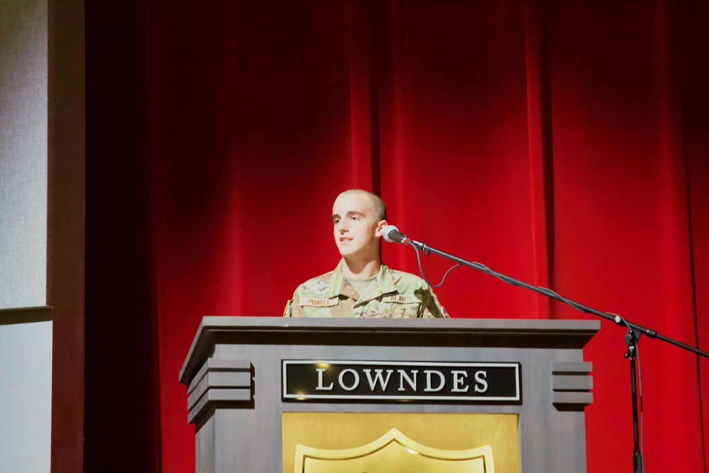 Cadet addressing the group from the podium
