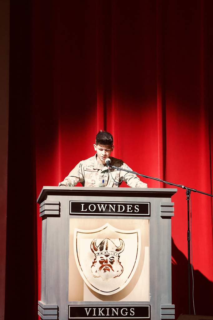 Cadet addressing the group from the podium