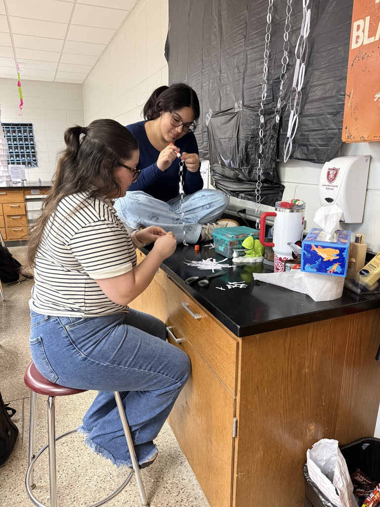 Students making paper chains