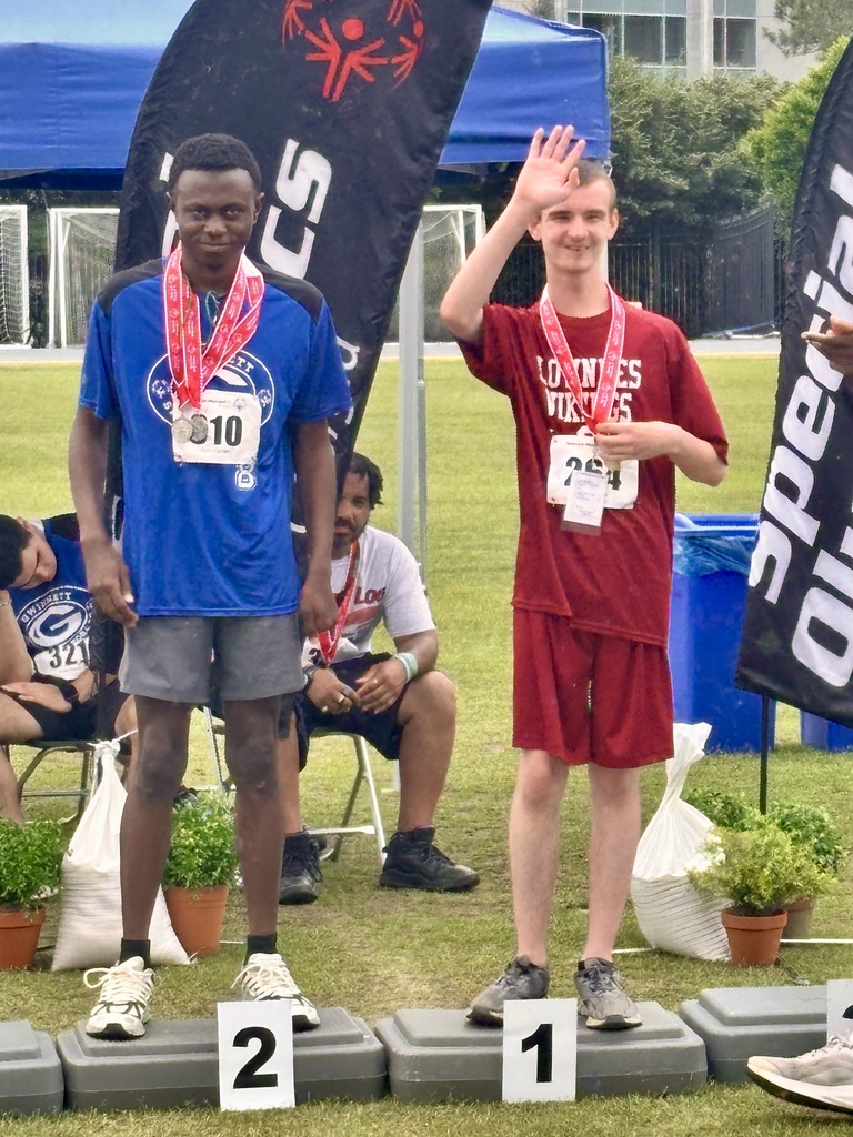 Student on awards podium