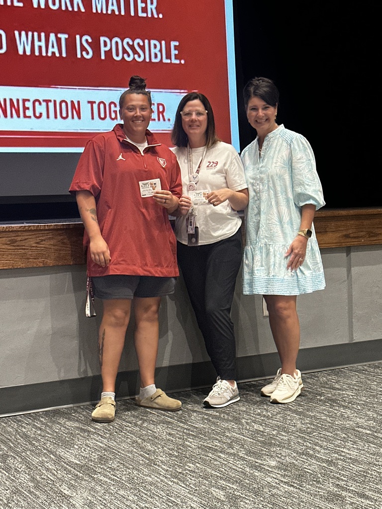 Assistant principal with two teachers who won Talk of the Town prizes