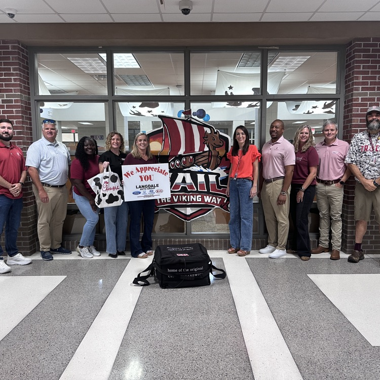 staff with Langdale Auto Group representatives 