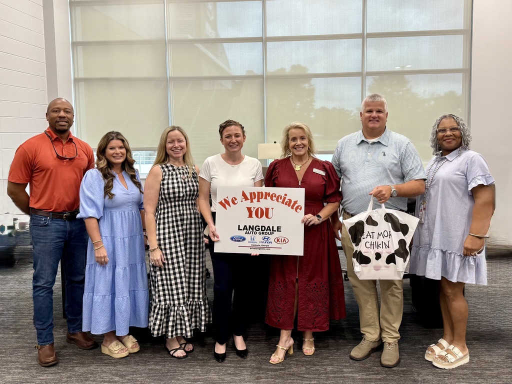 LHS admin and counselors with representatives of the Langdale Auto Group