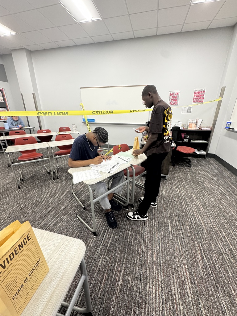 Students working to solve the case