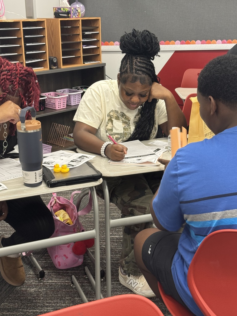 Students working to solve the case
