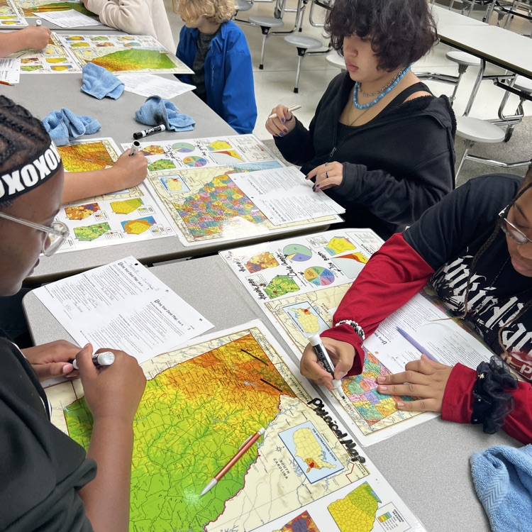 students working with maps