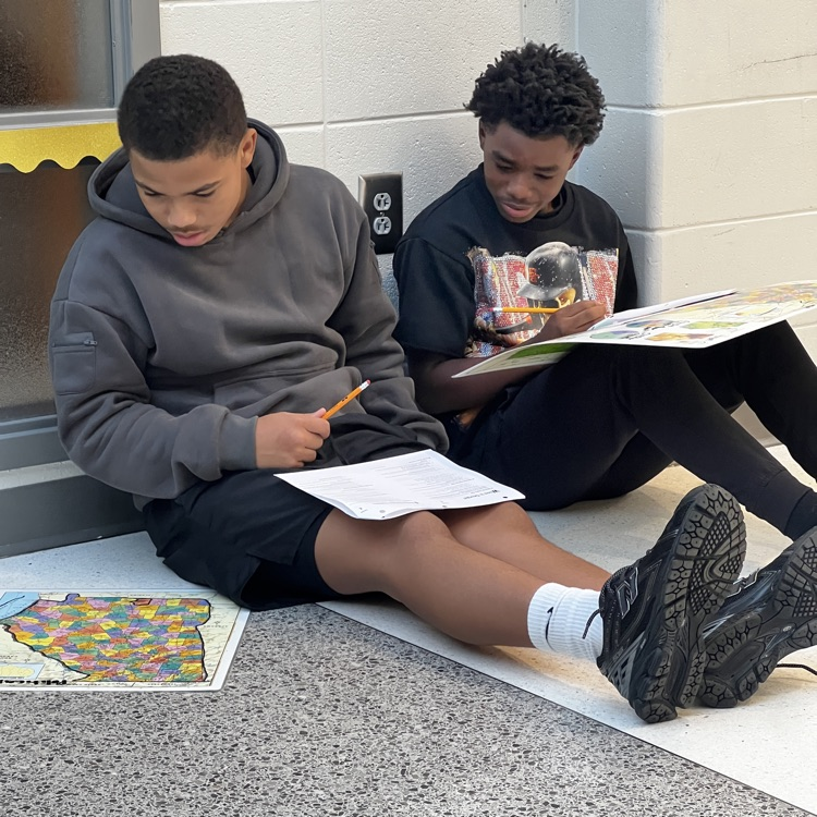students working with maps