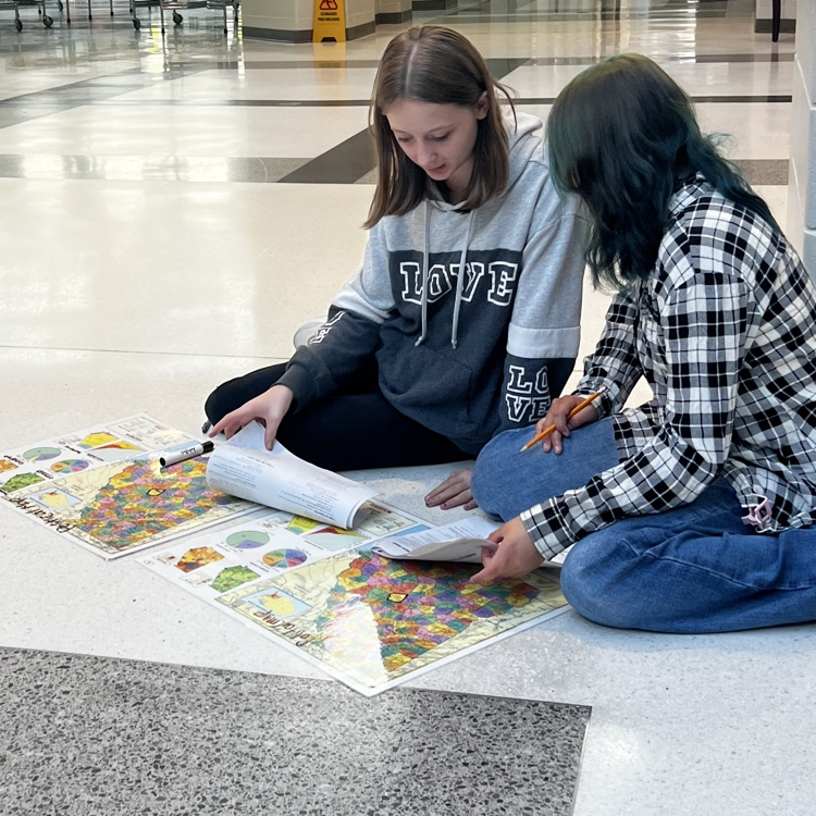 students working with maps
