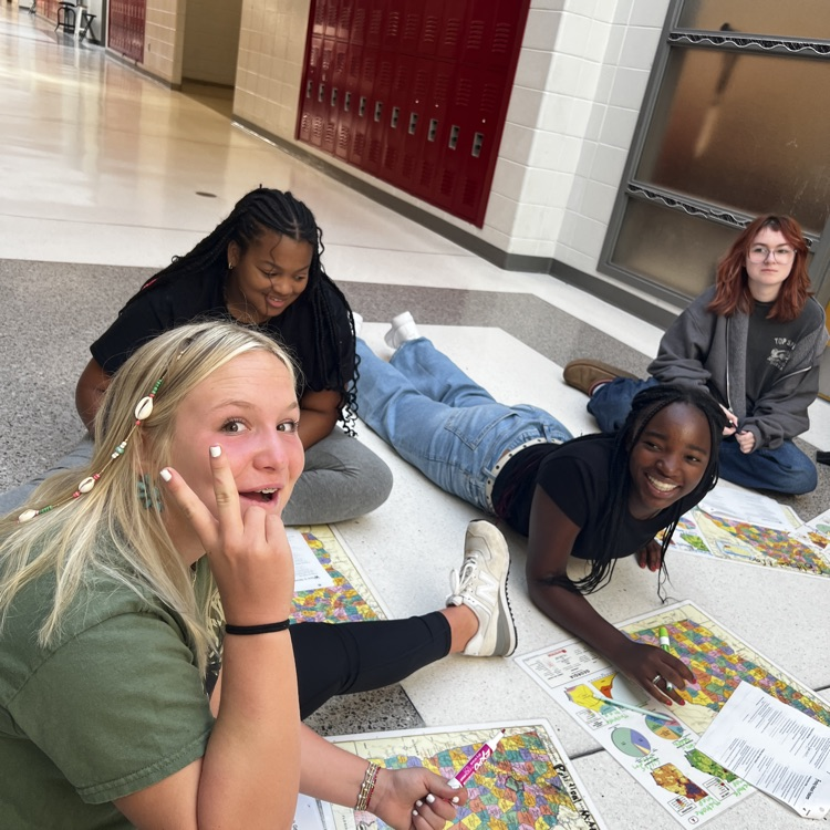 students working with maps