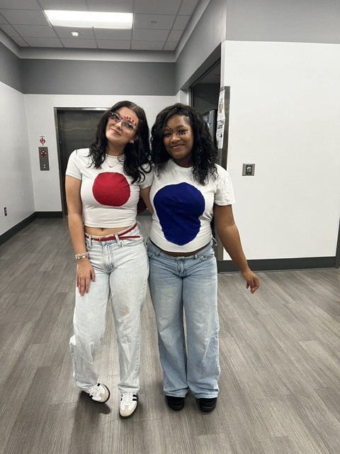 Students with Twister dot shirts