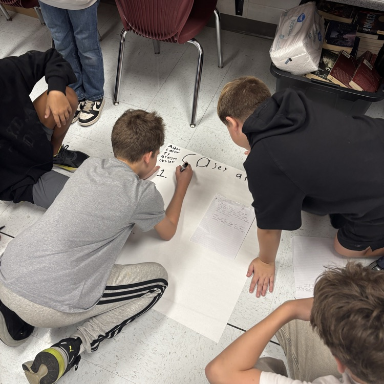 students working with poem 