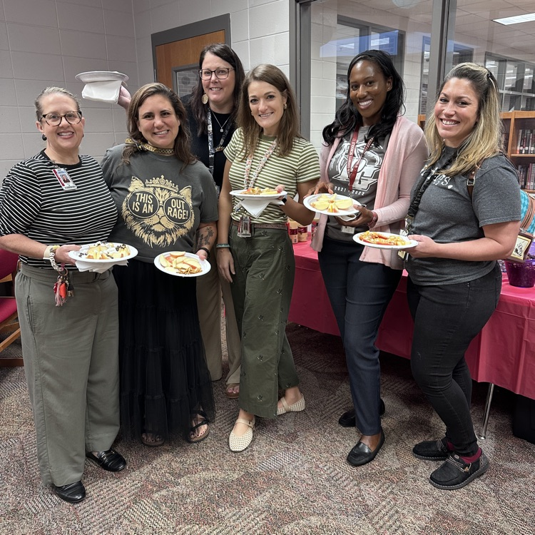 teachers holding apple nachos 