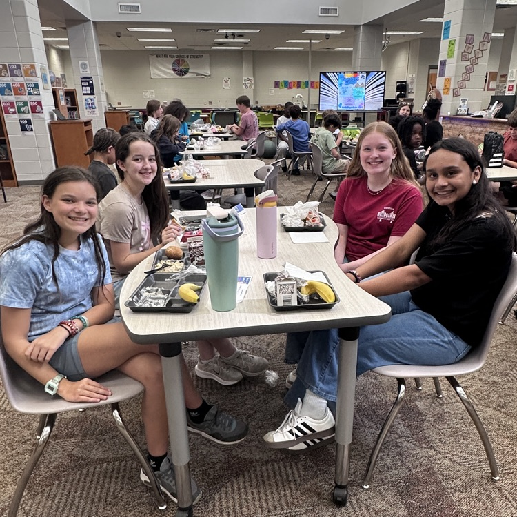 students eating in library 
