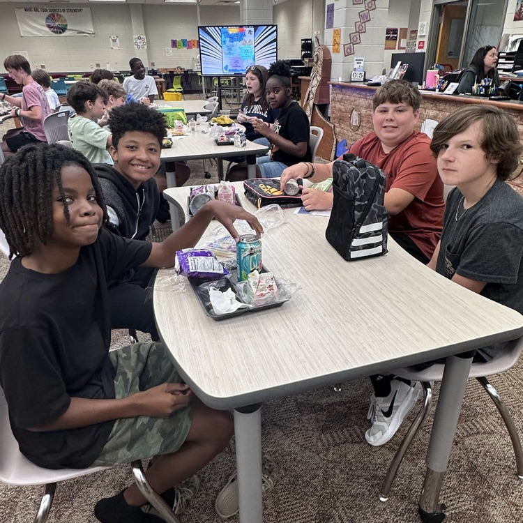 students eating in library 