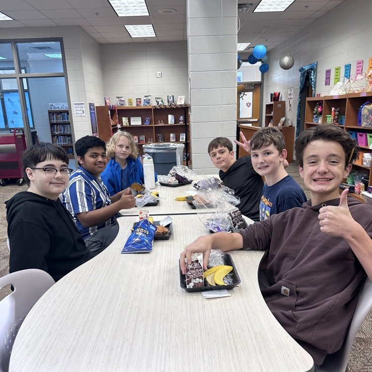 students eating in library 