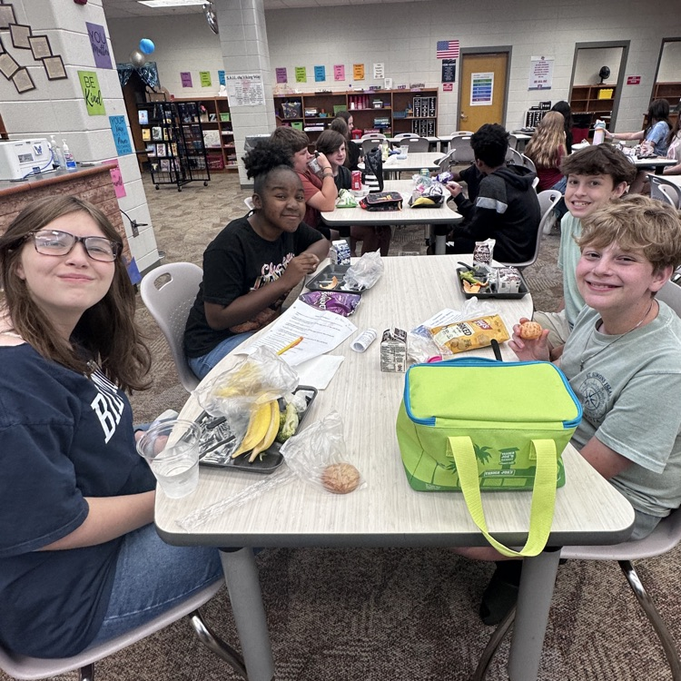 students eating in library 