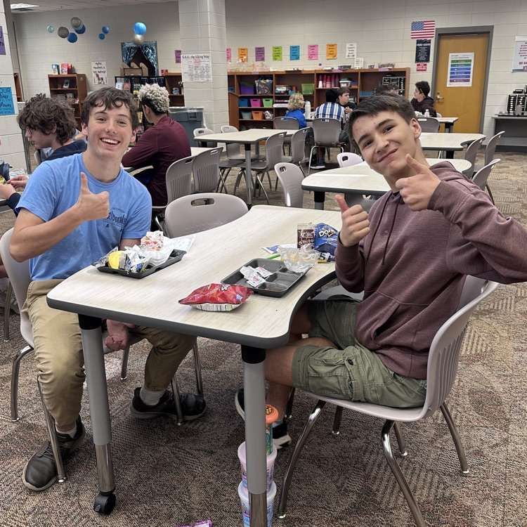 students eating in library 